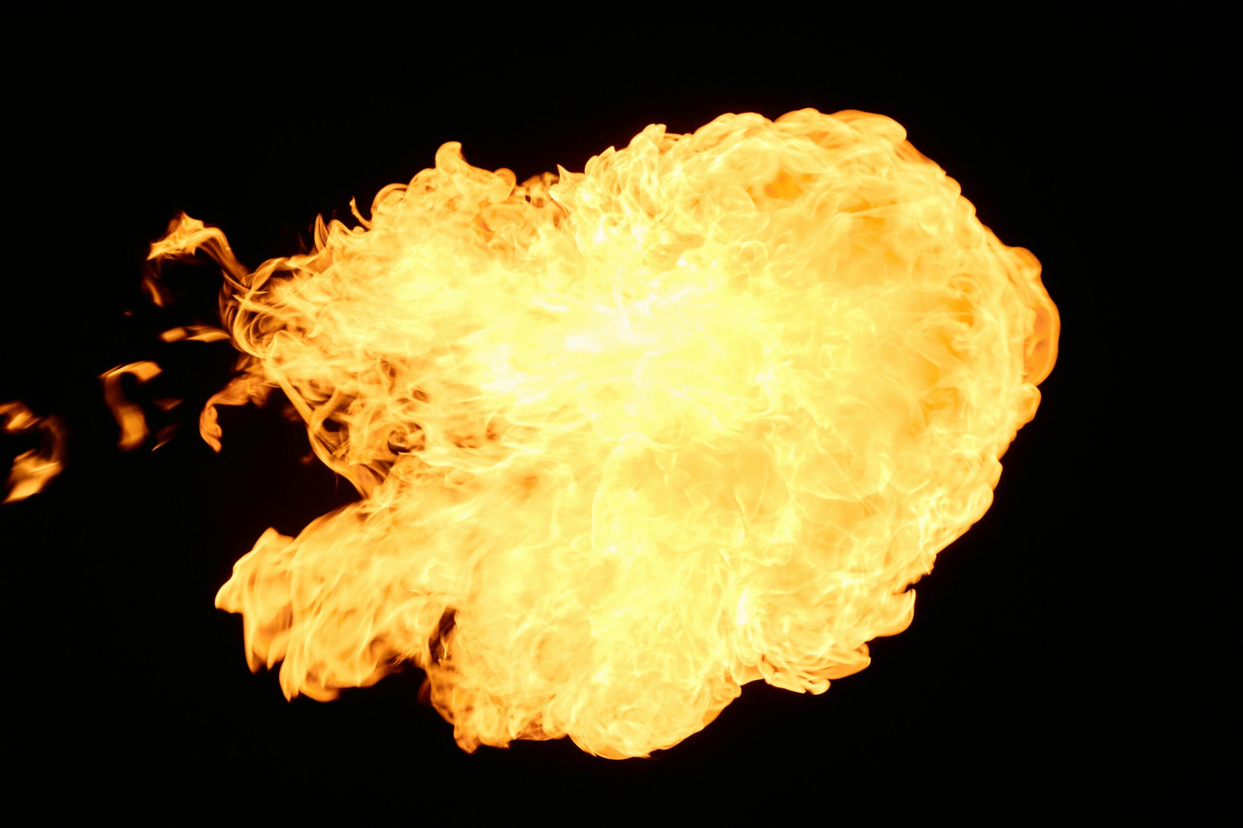 An orange explosion against a black background.