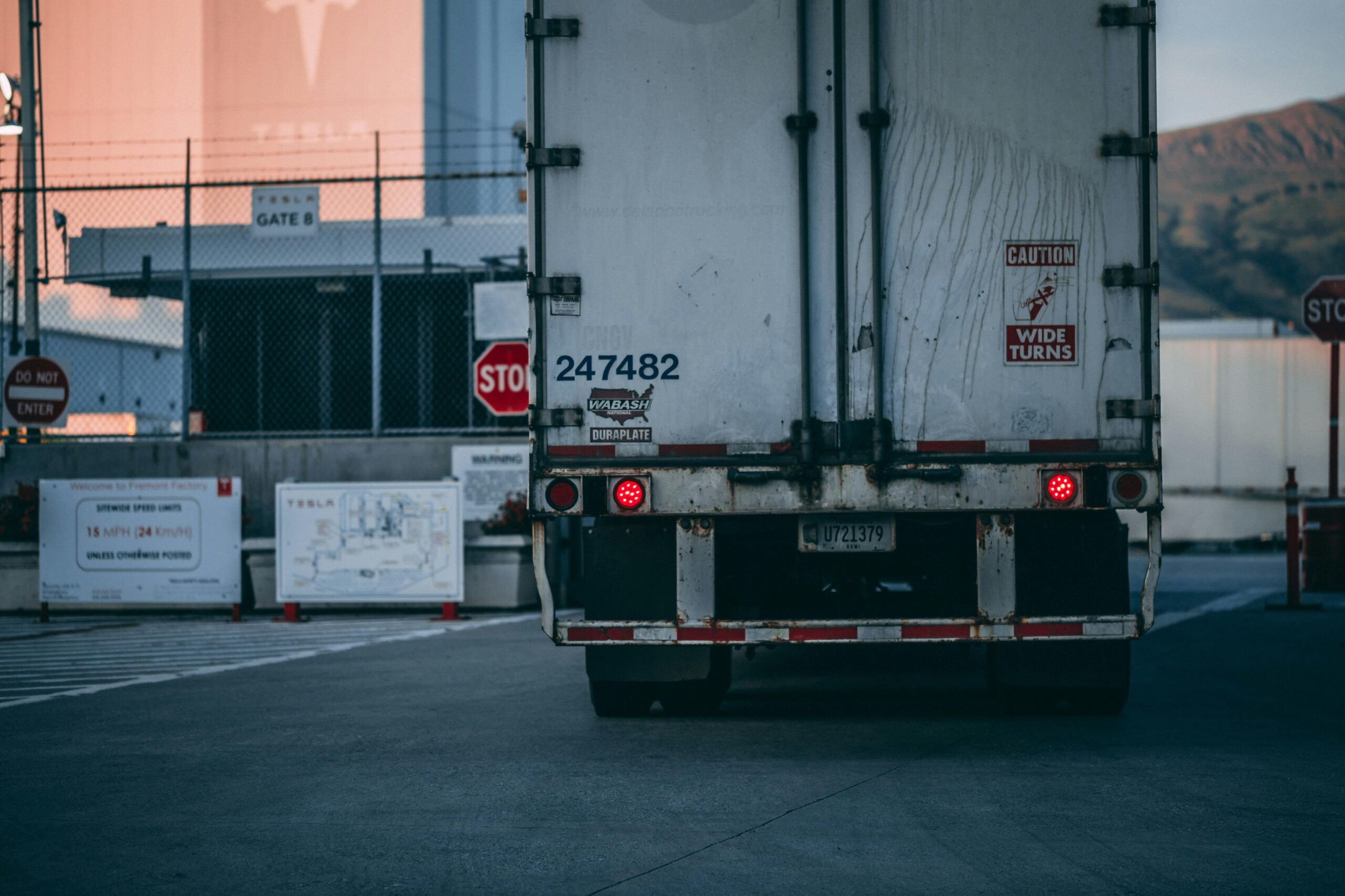 Truck making a right-hand turn at an intersection.