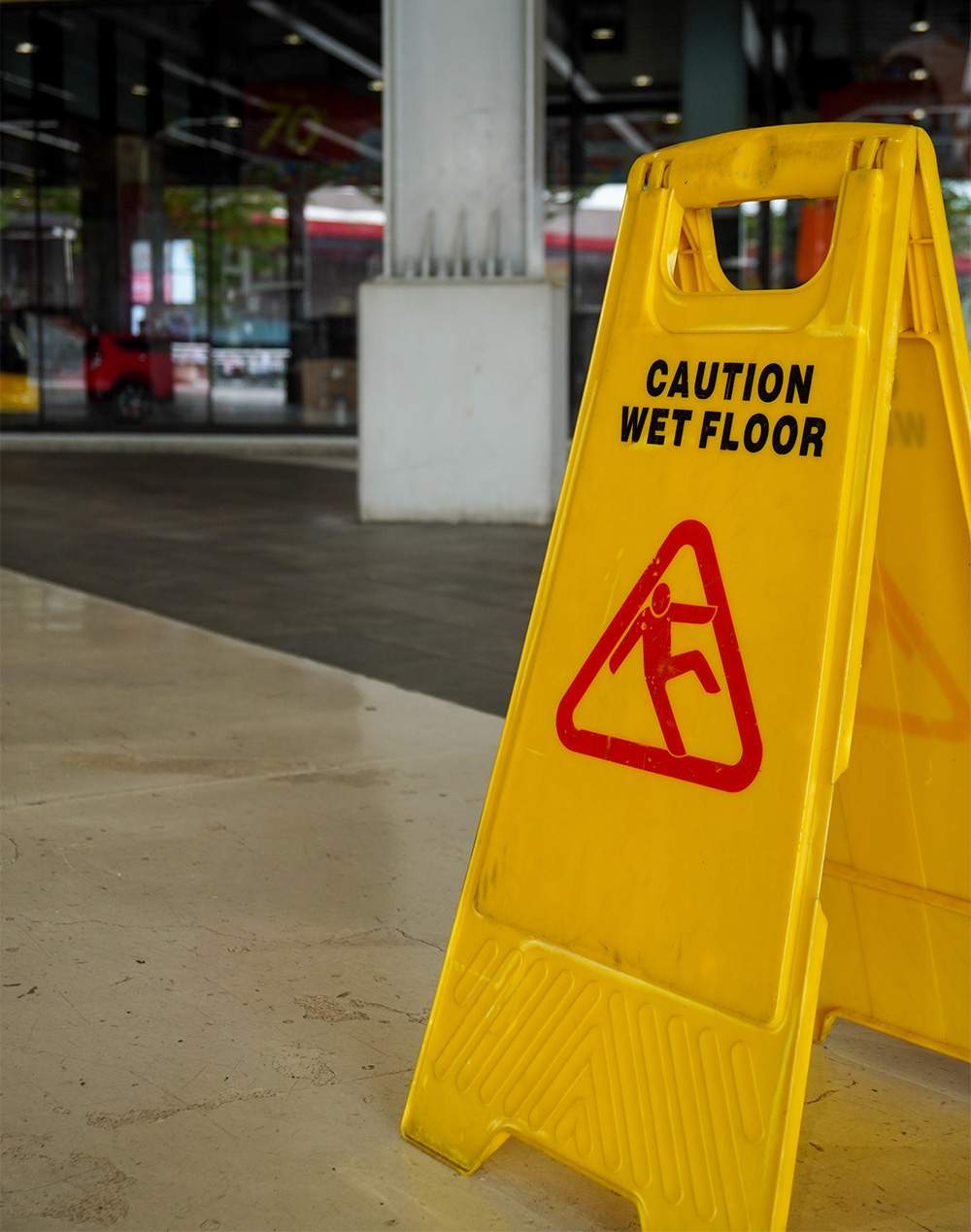 Slip and Fall Occurrences. Wet floor sign.